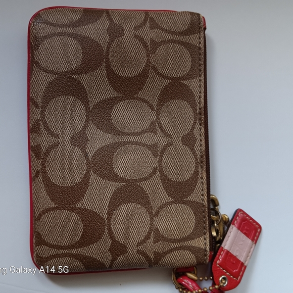 Coach wristlet beige pink straps. Excellent condition - Picture 6 of 7
